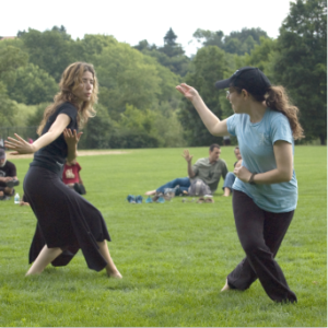 2 women practicing Boabom outside